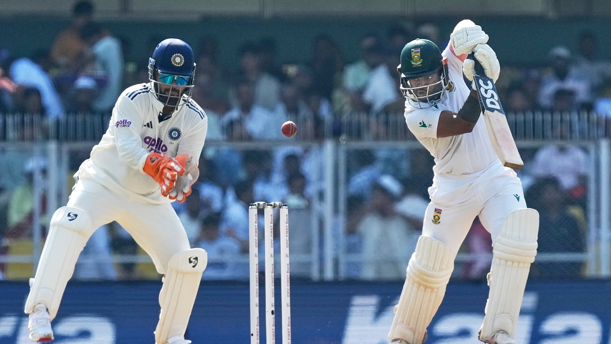 (AP Photo/Anupam Nath) : South Africa's captain Temba Bavuma plays a shot on the first day of the second cricket test match between India and South Africa in Guwahati, India, Saturday, Nov. 22, 2025.
