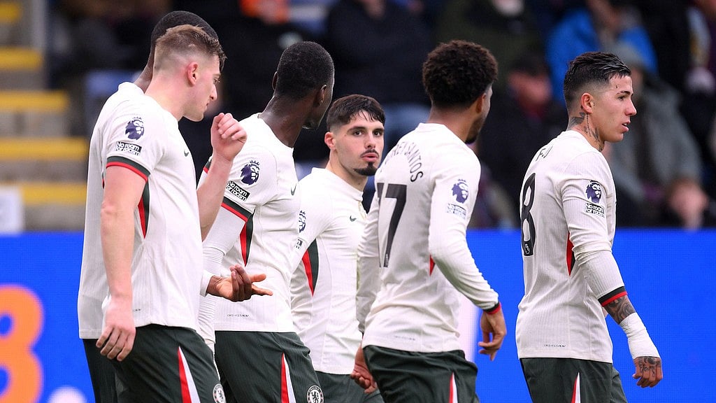 Photo: AP : Burnley Vs Chelsea Highlights, English Premier League: Pedro Neto, centre, celebrates with teammates after scoring the opening goal.