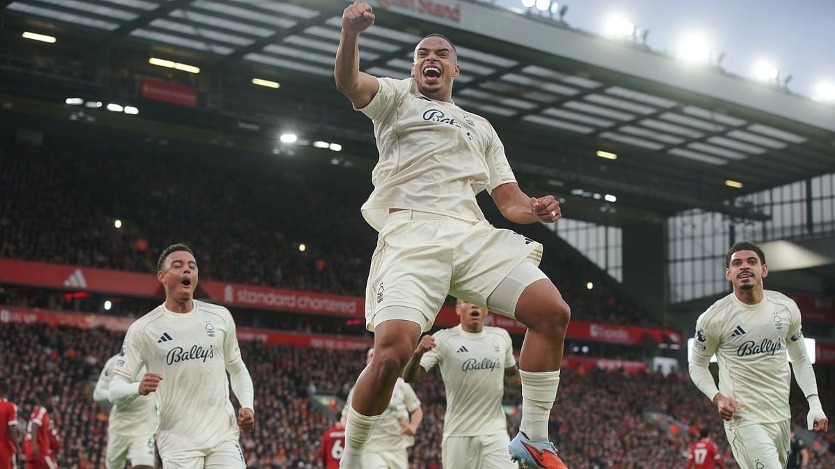 | Photo: AP/Ian Hodgson : Nottingham Forest's Murillo celebrates after scoring his side's opening goal during the English Premier League match against Liverpool on November 22, 2025. 