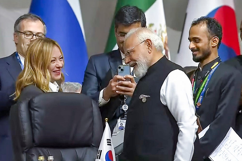 Prime Minister Narendra Modi during a meeting with his Italian counterpart Giorgia Meloni at the G20 Leaders' Summit, in Johannesburg, South Africa.  - | Photo: @pmoindia/YT via PTI