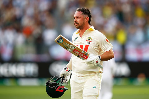Australia's Travis Head leaves the field after losing his wicket on day two of the first Ashes cricket test match between Australia and England in Perth.