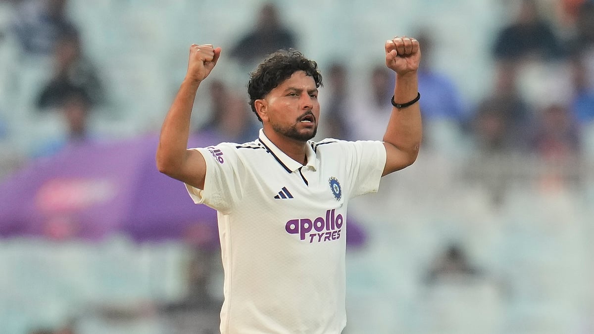 (AP Photo/Aijaz Rahi) : India's Kuldeep Yadav celebrates the dismissal of South Africa's Marco Jansen on the second day of the first cricket test match between India and South Africa in Kolkata, India, Saturday, Nov. 15, 2025.