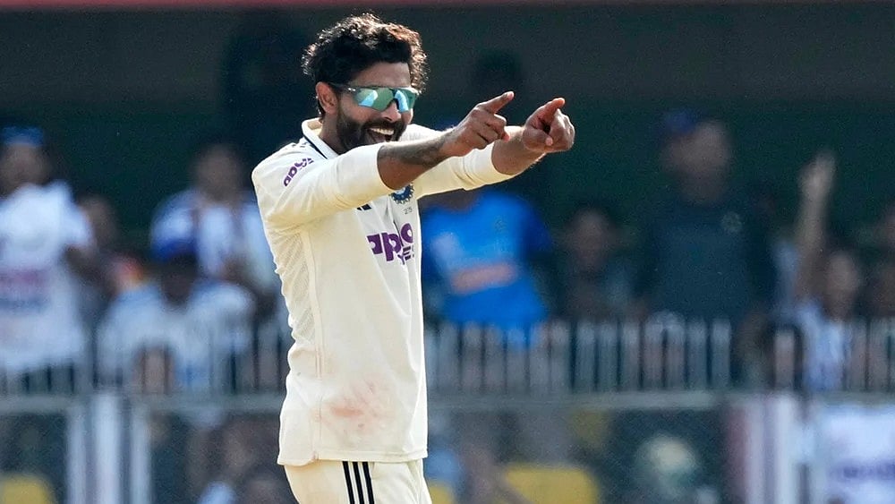 | Photo: AP/Anupam Nath : India's Ravindra Jadeja celebrates the dismissal of South Africa's captain Temba Bavuma on the first day of the second cricket test match between India and South Africa in Guwahati.