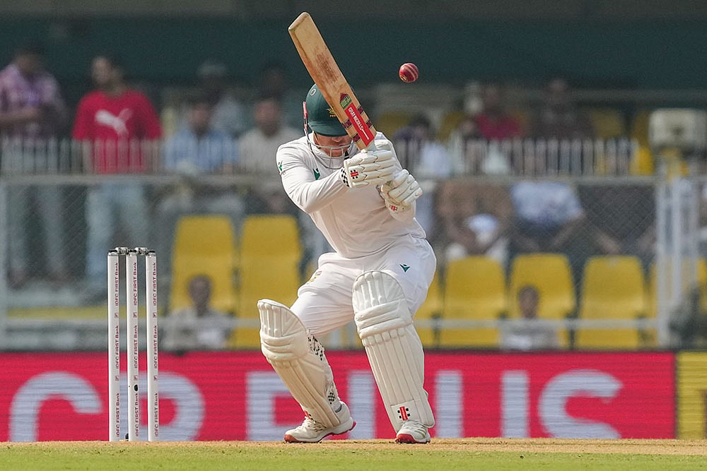| Photo: PTI/Shahbaz Khan : South Africa's Kyle Verreynne ducks the ball during the day two of the second Test cricket match of a series between India and South Africa, at ACA Stadium in Guwahati.