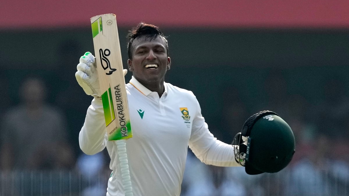 (AP Photo/Anupam Nath) : South Africa's Senuran Muthusamy celebrates after scoring a century on the second day of the second cricket test match between India and South Africa in Guwahati, India, Saturday, Nov. 22, 2025.
