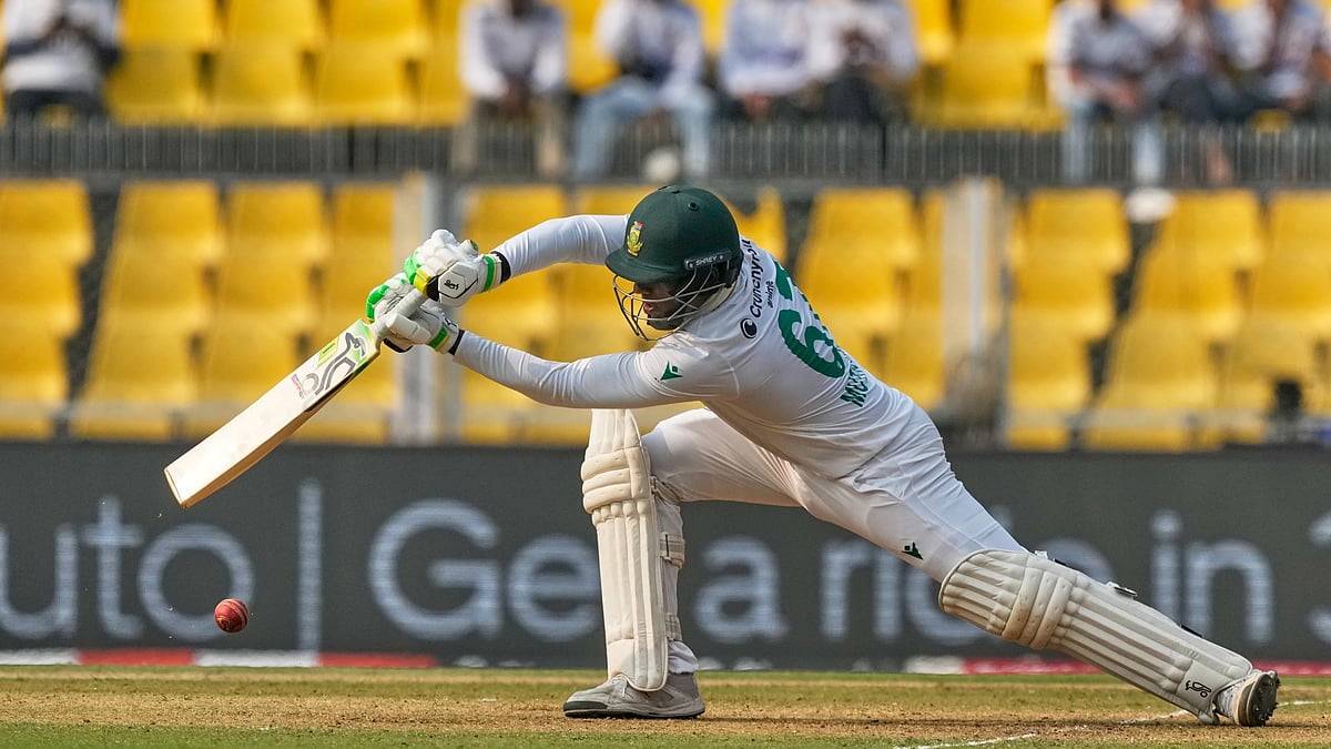 (AP Photo/Anupam Nath) : South Africa's Senuran Muthusamy plays a shot on the second day of the second cricket test match between India and South Africa in Guwahati, India, Saturday, Nov. 22, 2025.