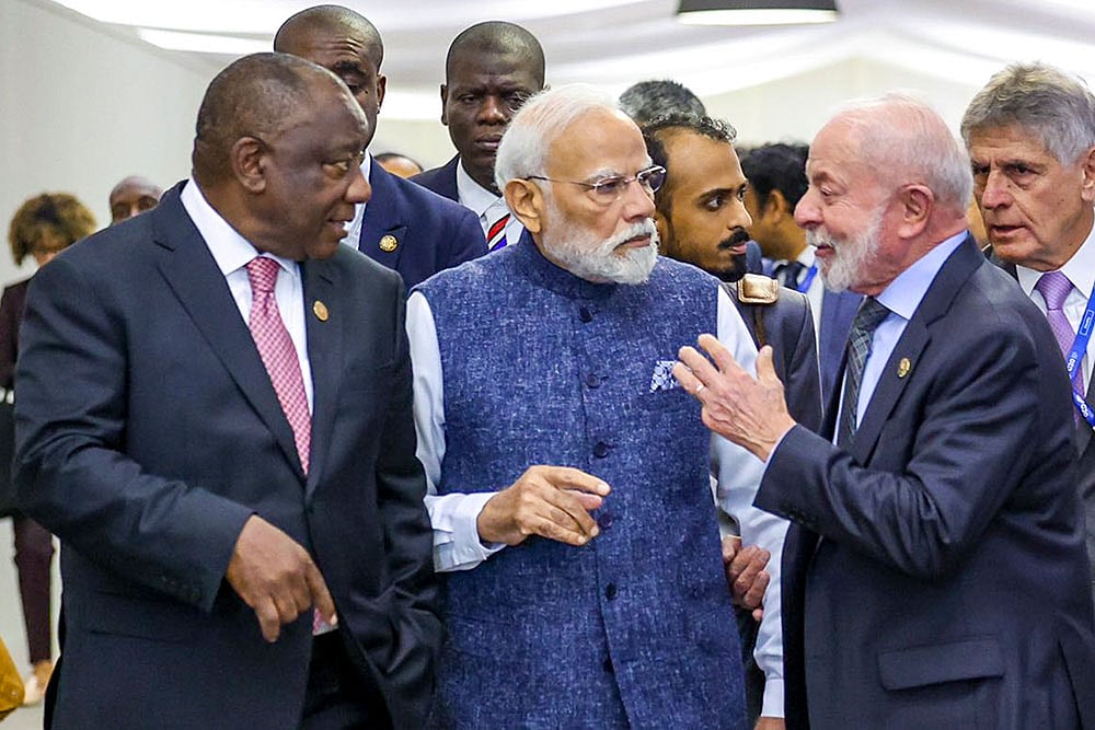 | Photo: @MEAIndia/X via PTI : In this image, Prime Minister Narendra Modi with South African President Cyril Ramaphosa, left, and Brazilian President Luiz Inacio Lula da Silva, right, during IBSA Leaders' meeting, on the sidelines of the G20 Summit, in Johannesburg, South Africa.
