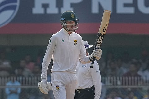 South Africa's Marco Jansen celebrates his half century during the day two of the second Test cricket match of a series between India and South Africa, at ACA Stadium in Guwahati.