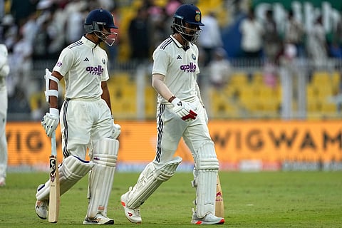 India's KL Rahul, right, and India's Yashasvi Jaiswal walk off the field at the end of the second day of the second cricket test match between India and South Africa in Guwahati.