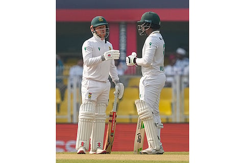 South Africa's Senuran Muthusamy and Kyle Verreynne during the day two of the second Test cricket match of a series between India and South Africa, at ACA Stadium in Guwahati.