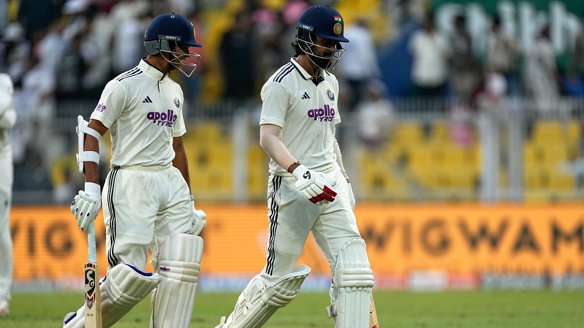 (AP Photo/Anupam Nath) : India's KL Rahul, right, and India's Yashasvi Jaiswal walk off the field at the end of the second day of the second cricket test match between India and South Africa in Guwahati, India, Saturday, Nov. 22, 2025
