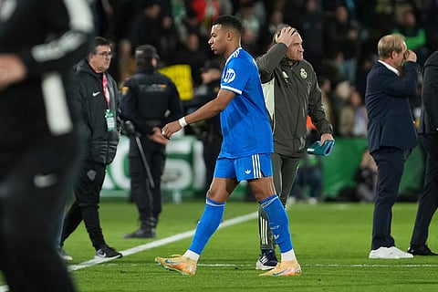 Real Madrid's Kylian Mbappe walks after the Spanish La Liga soccer match between Elche and Real Madrid in Elche, Spain.
