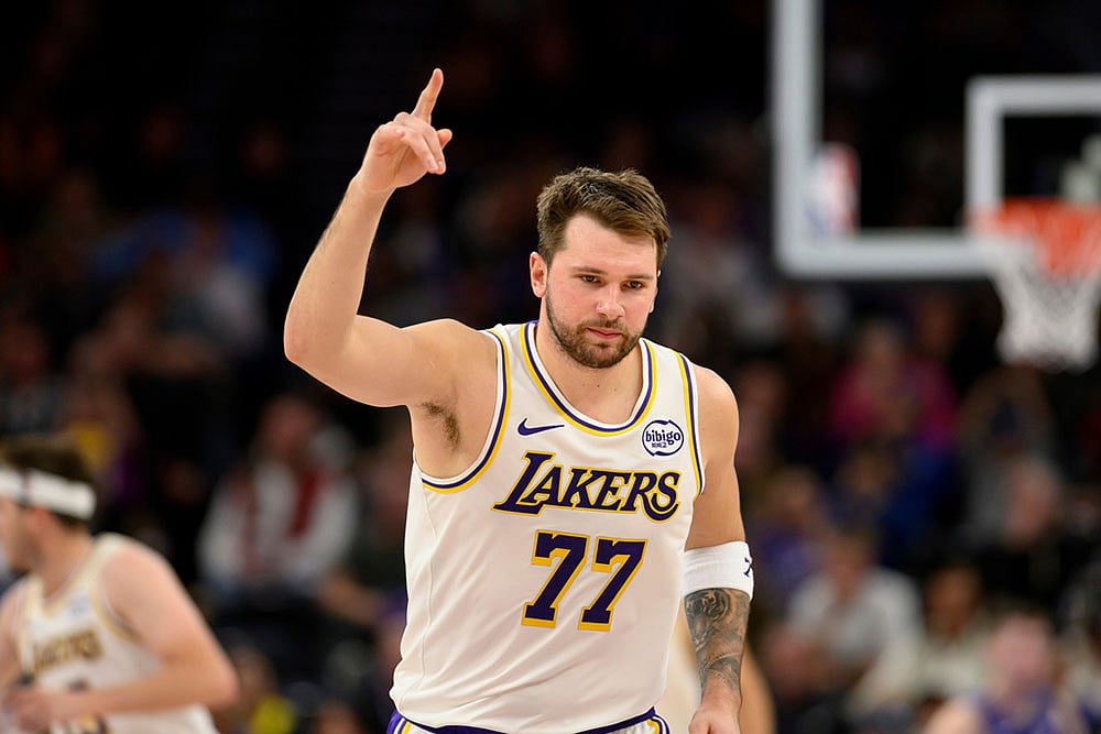 | Photo: AP/Tyler Tate : Los Angeles Lakers guard Luka Doncic reacts to a made three-point shot during the second half of an NBA basketball game against the Utah Jazz in Salt Lake City.