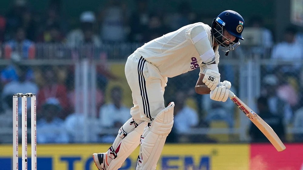 Photo: AP/Anupam Nath : India's Washington Sundar plays a shot on the third day of the second cricket test match between India and South Africa in Guwahati.