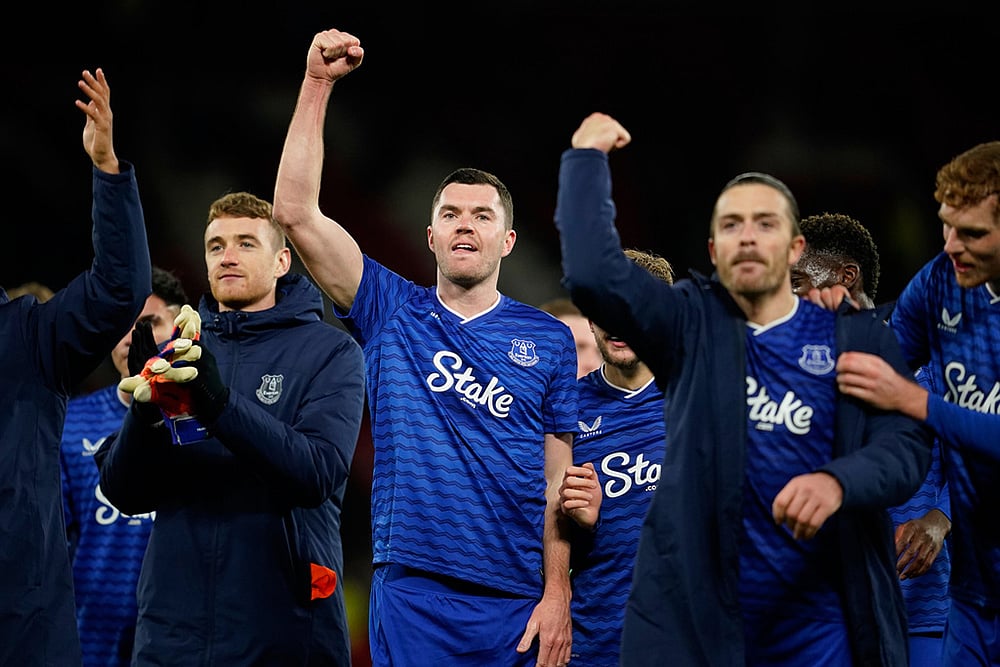 | Photo: AP/Dave Thompson : Everton's Michael Keane, center, celebrates after the English Premier League soccer match between Manchester United and Everton in Manchester, England.
