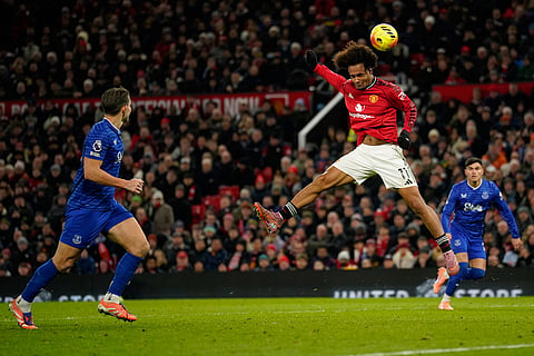 Manchester United's Joshua Zirkzee heads the ball during the English Premier League soccer match between Manchester United and Everton in Manchester, England.