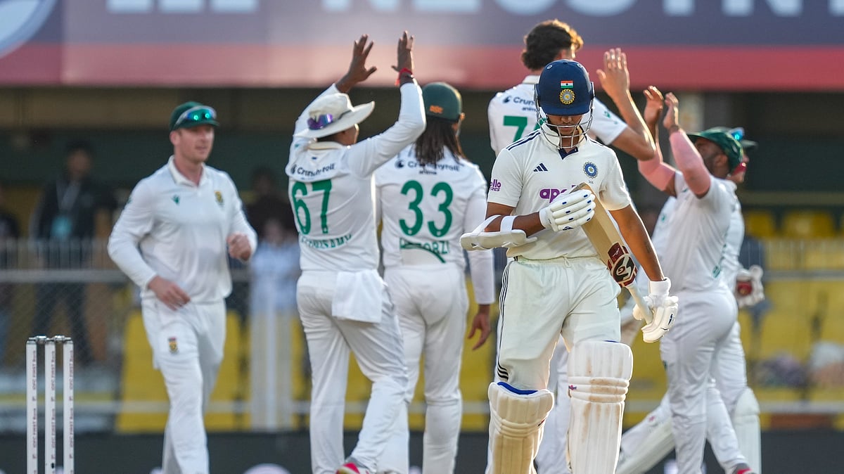 (PTI Photo/Shahbaz Khan) : India's Yashasvi Jaiswal walks off after being dismissed as South African's players celebrate during the fourth day of the Test cricket match between India and South Africa at the Barsapara Cricket Stadium, in Guwahati, Tuesday, Nov. 24, 2025. 