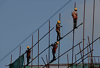 India’s New Labour Codes Take Effect | All You Need To Know IMAGO / NurPhoto : Economy Workers are seen in an under construction site in Mumbai, India, 30 August, 2023.