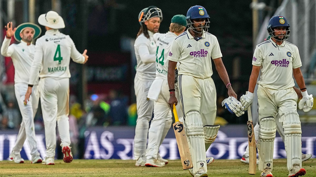 AP : India's captain India's Kuldeep Yadav, right, and Sai Sudharsan walk off the field at the end of the fourth day of the second cricket test match between India and South Africa.