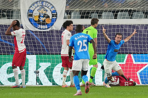 Pafos' Ivan Sunjic, right, celebrates after scoring his side's second goal during the Champions League opening phase soccer match between Pafos FC and AS Monaco in Limassol, Cyprus,