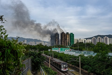 Smoke rises after a fire broke out at Wang Fuk Court, a residential estate in the Tai Po district of Hong Kong's New Territories.