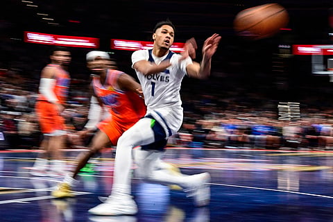 Minnesota Timberwolves guard/forward Terrence Shannon Jr. (1) pass the ball against Oklahoma City Thunder during the second half of an Emirates NBA Cup basketball game in Oklahoma City. 