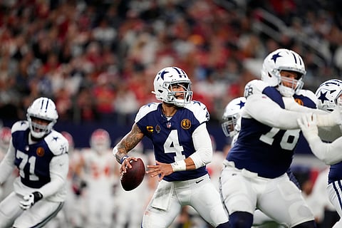 Dallas Cowboys quarterback Dak Prescott throws during the second half of an NFL football game against the Kansas City Chiefs in Arlington, Texas. 