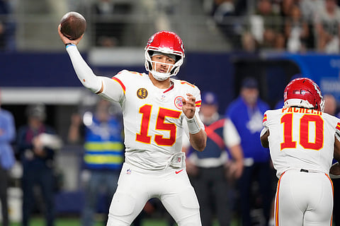 Kansas City Chiefs quarterback Patrick Mahomes throws during the second half of an NFL football game against the Dallas Cowboys in Arlington, Texas. 