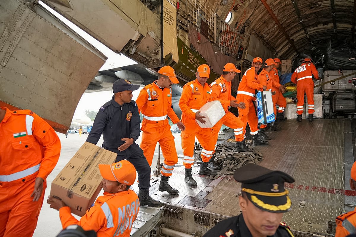 @DrSJaishankar/X via PTI Photo : In this image posted on Nov. 29, 2025, NDRF personnel along with a consignment of Indian humanitarian aid, arrive in cyclone-hit Sri Lanka as part of 'Operation Sagar Bandhu'. 
