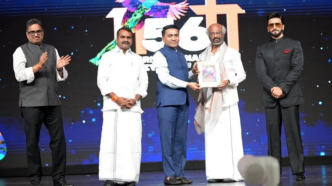  PTI Photo : Goa Chief Minister Pramod Sawant confers the lifetime achievement award to superstar Rajinikanth as Union Minister of State L. Murugan and Bollywood actor Ranveer Singh look on during the closing ceremony of the 56th International Film Festival of India (IFFI), in Panaji, Goa, Friday, Nov. 28, 2025.