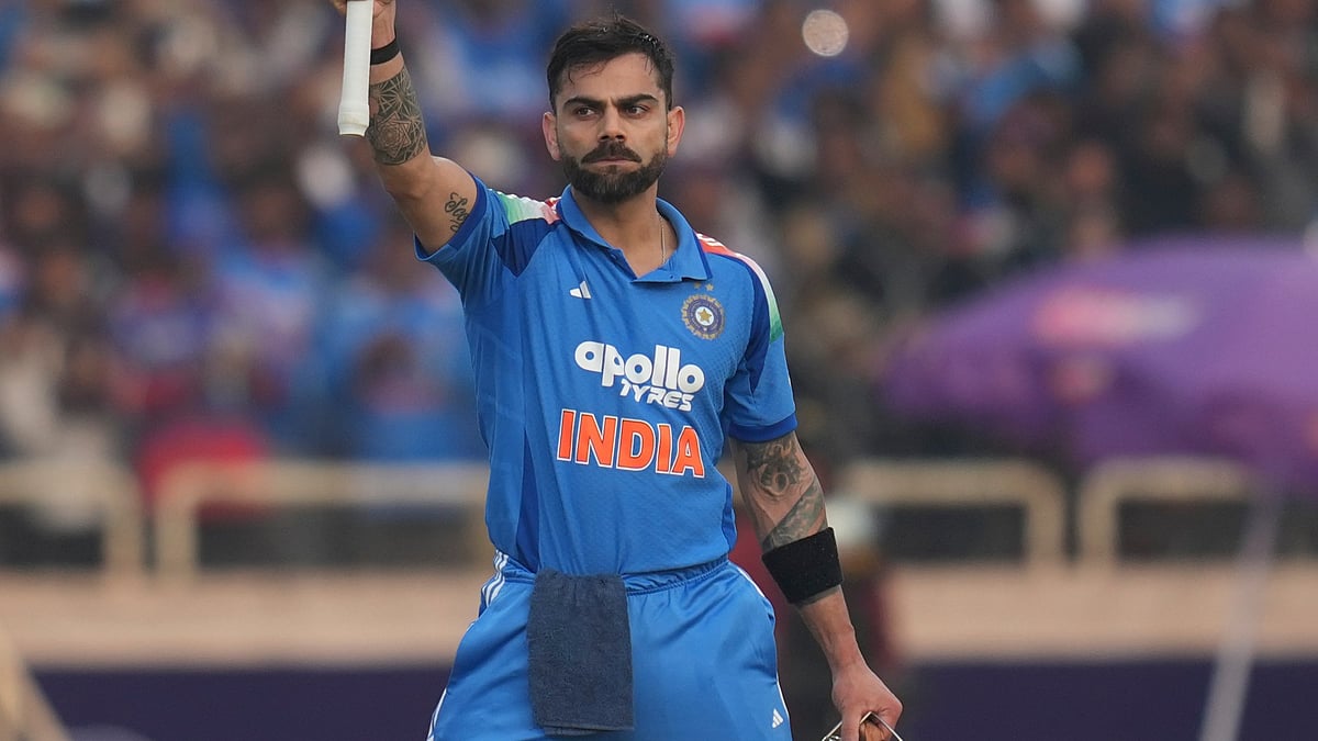 AP/Rafiq Maqbool : Virat Kohli celebrates his century for the Indian team in nearly a year during the first ODI between India and South Africa in Ranchi