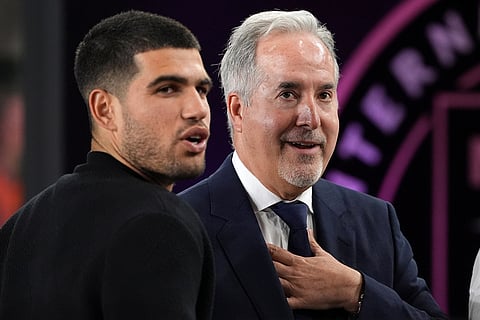 Tennis star Carlos Alcaraz, left, talks with Inter Miami co-owner Jorge Mas at the start of an MLS Eastern Conference final soccer match against New York City FC in Fort Lauderdale, Florida. 