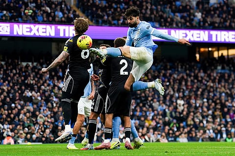 Manchester City's Josko Gvardiol kicks the ball during the English Premier League soccer match between Manchester City and Leeds United at Etihad Stadium, Manchester, England.