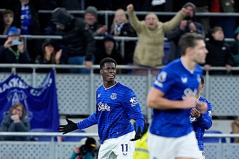 Everton's Thierno Barry, left, celebrates scoring during the English Premier League soccer match between Everton and Newcastle United in Liverpool, England.
