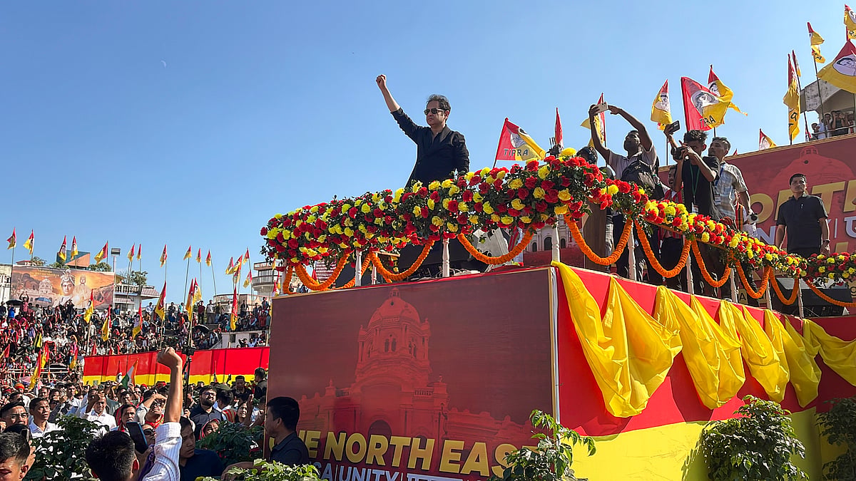 PTI : Agartala: Tipra Motha Party (TMP) founder Pradyot Manikya Debbarma greets the gathering during the 'One North East Unity' rally, in Agartala, Tripura, Thursday, Nov. 27, 2025. 
