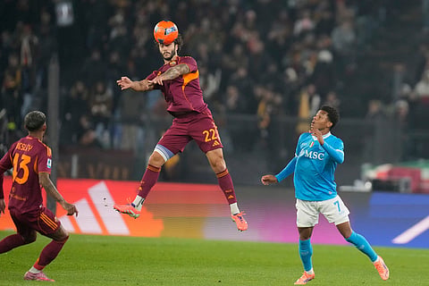 Roma's Mario Hermoso heads the ball during the Serie A soccer match between Roma and Napoli in Rome.