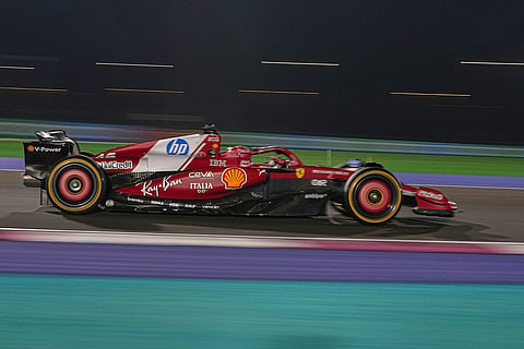 Ferrari driver Charles Leclerc of Monaco steers his car during the Qatar Formula One Grand Prix, in Lusail, Qatar.
