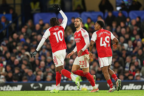 From left, Arsenal's Eberechi Eze, Mikel Merino, Myles Lewis-Skelly during the English Premier League soccer match between Chelsea and Arsenal in London, England.
