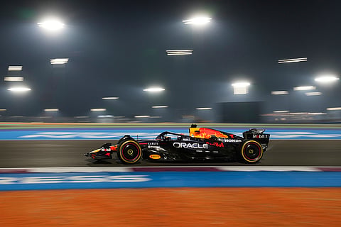Red Bull driver Max Verstappen of the Netherlands steers his car during the Qatar Formula One Grand Prix, at the Lusail International Circuit, in Lusail, Qatar.