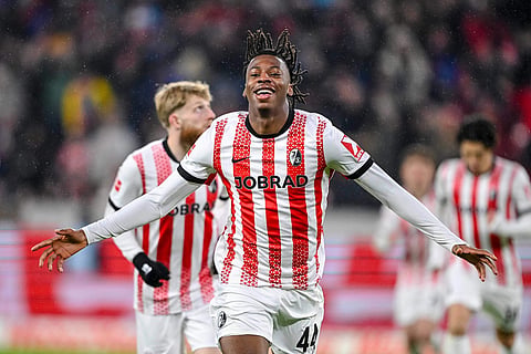 Johan Manzambi of SC Freiburg celebrates after scoring a goal, during a German Bundesliga soccer match between SC Freiburg and 1. FSV Mainz 05, in Freiburg im Breisgau, Germany.