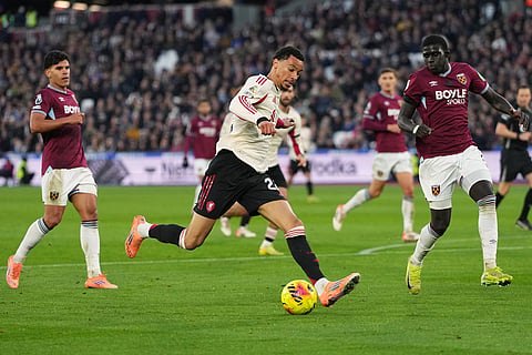 Liverpool's Hugo Ekitike controls the ball during the English Premier League soccer match between West Ham United and Liverpool in London.