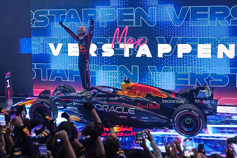 Red Bull driver Max Verstappen of the Netherlands celebrates after winning the Qatar Formula One Grand Prix, in Lusail, Qatar.