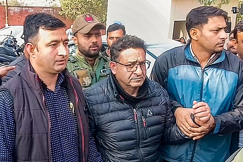 Shafat Ahmed Shangloo, arrested in connection with the 1989 kidnapping of Rubaiyya Sayeed, the daughter of then Union Home Minister Mufti Mohammed Sayeed, being produced before a TADA court, in Jammu.