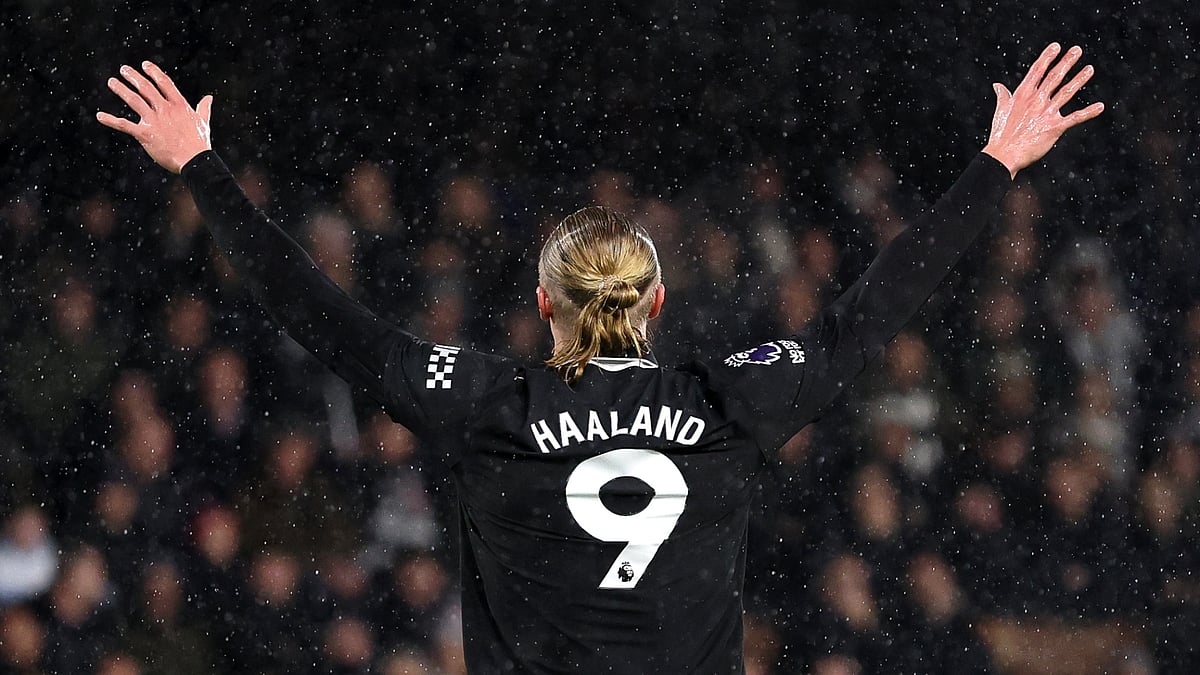 Erling Haaland celebrates his 100th Premier League goal