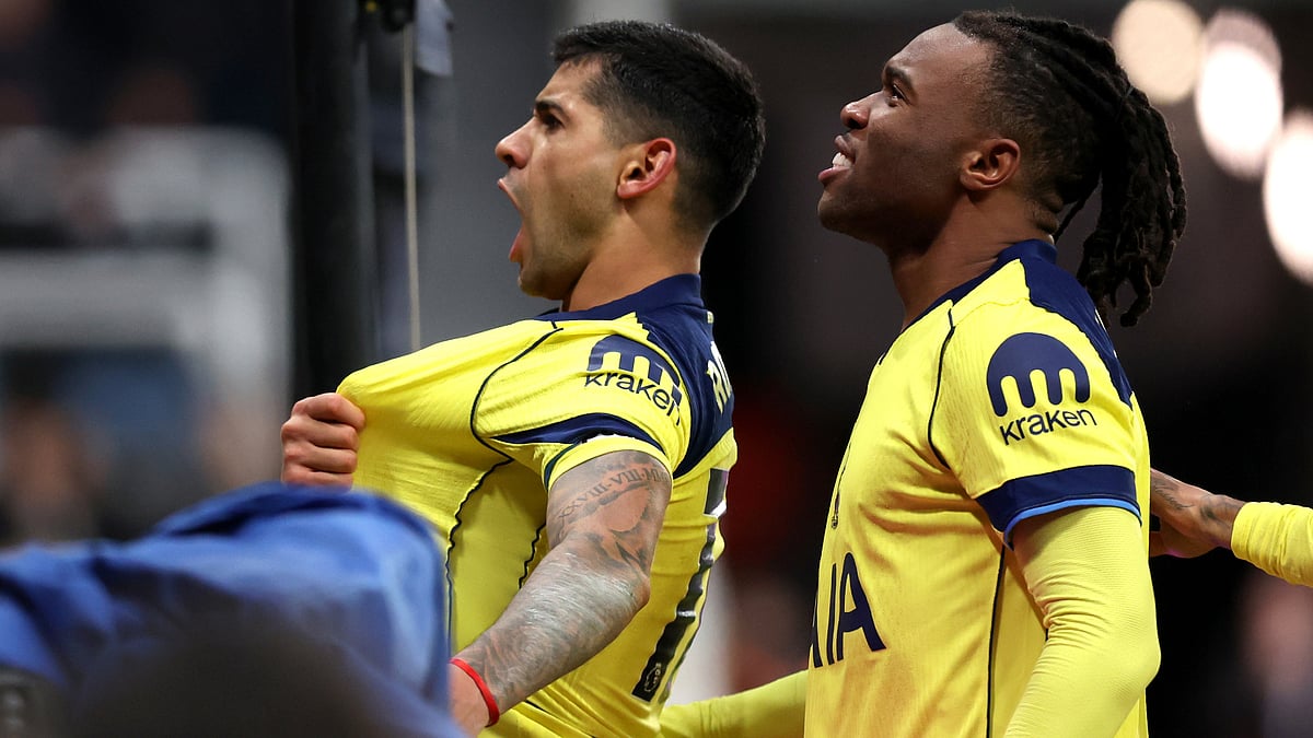 Cristian Romero celebrates after scoring his second goal