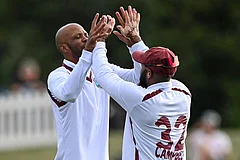 West Indies' Roston Chase, left, and teammate John Campbell celebrate after taking the wicket of New Zealand's Nathan Smith during their cricket test match in Christchurch, New Zealand. - | Photo: John Davidson/Photosport via AP
