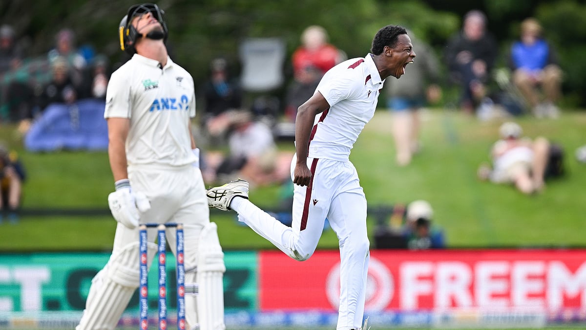 | Photo: AP/Andrew Cornaga                                           : West Indies bowler Johann Layne celebrates the wicket of New Zealand's Will Youn during their cricket test match in Christchurch on December 2, 2025.