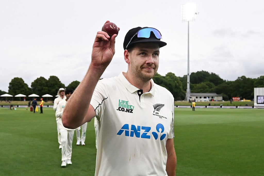 | Photo: Andrew Cornaga/Photosport via AP : New Zealand's Jacob Duffy hold up the ball after taking 5 wickets against the West Indies during the second day of their cricket test match in Christchurch, New Zealand.