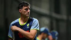 File : Australian skipper Pat Cummins has ruled himself out of the ICC T20 World Cup as he's not been able to recover fully from back injury yet.