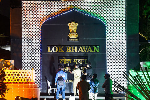 Worker install lettering on a signboard reading “Lok Bhavan”, in Hyderabad. The Union Home Ministry (MHA) wrote to all Governors and Lieutenant Governors suggesting that the name of “Raj Bhavan” be changed to “Lok Bhavan”.